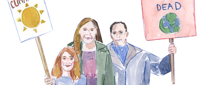 Family at a protest, holding signs.