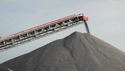 Coal mine header image: dark landscape, smoke, industrial structures, text.