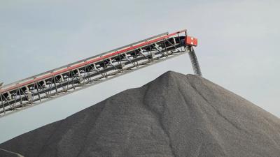 Coal mine header image: dark landscape, smoke, industrial structures, text.