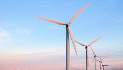 Wind turbine, right orientation, blue sky, white clouds.