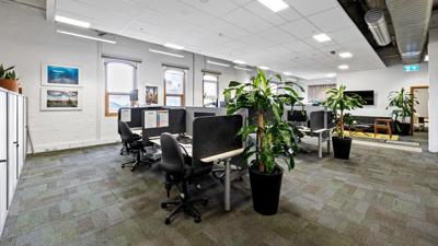 Victorian building, Leicester Street, Carlton. Brick facade, ornate details, street view.