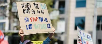 Sign with ROTC text, blue background, white lettering.