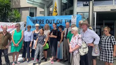 Header image: Queensland landscape, blue sky, green trees, and a road.
