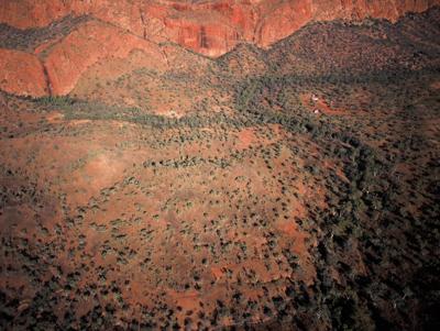 Aerial view, South Kimberley, Australia. Rugged landscape, river, and sparse vegetation.