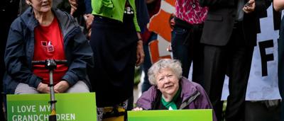 Image: A colorful reef scene with text "I love my grandchildren. Reef, not coal.