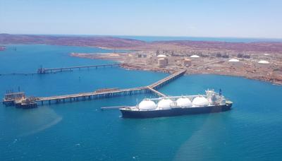 Header image: Woodside logo over a blurred landscape with a blue sky.