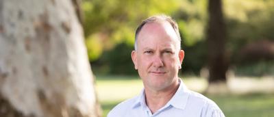 Man, Gavan McFadzean, smiling, headshot.