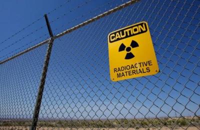 Nuclear power plant section diagram. Reactor core, containment structure, and cooling systems are visible.