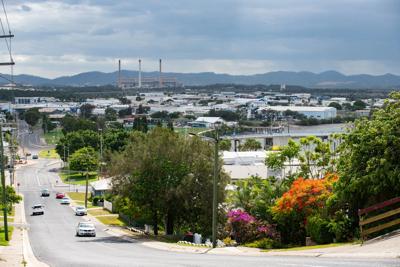Header image: Gladstone, Queensland. Industrial landscape with smokestacks and harbor.