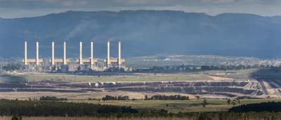 A vibrant coral reef scene with diverse fish and marine life.