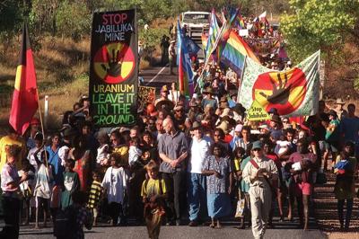 A protest sign with text, likely related to environmental activism and the Jabiluka mine.
