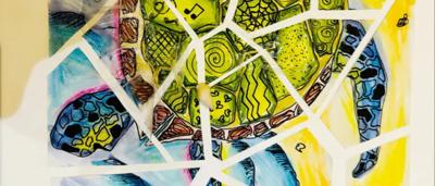 Ocean waves crashing on a sandy beach, captured from a low angle.