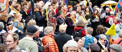 Crowd marching, Melbourne, 2015. People's Climate March. Signs, banners, diverse group.