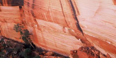 Kings Canyon landscape, red rock formations, blue sky, sunny day.