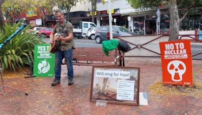 A vibrant graphic with text and shapes, featuring a blue background and colorful elements.