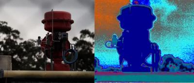 FLIR camera, thermal image of a person, showing heat signature.