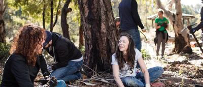 Community planting trees in Westgate Park, Melbourne.