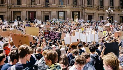 Header image: ROTC students in uniform, outdoors, with a building in the background.