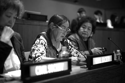 A woman, Aunty Sue, at a United Nations event, smiling.