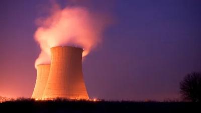 Cooling towers at dusk, nuclear power plant.