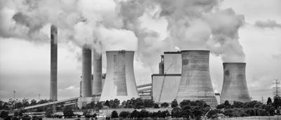 Yallourn power station, smoke stacks, blue sky, industrial landscape.