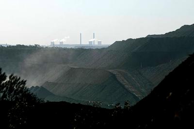 Mount Thorley Warkworth coal mine with Bayswater bituminous coal-powered Power Station in distance.
