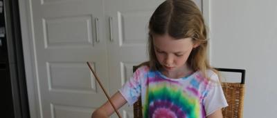 Child's artwork: black background, kangaroo, koala, fire, trees, "Black Summer Orphans" title.