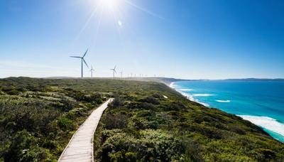 Header image: Albany wind farm, turbines against a blue sky.