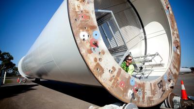 Header image: Portland manufacturing scene, industrial buildings, blue sky.