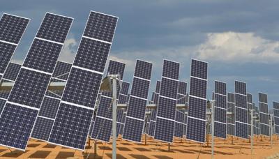 Header image: Wind turbine and solar panels against a blue sky, promoting renewable energy.