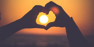 Header image: Sun, climate change graphic, heart shape, blue sky, text.