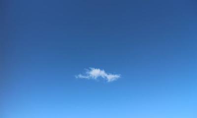 Cloud texture, white and gray, swirling patterns.