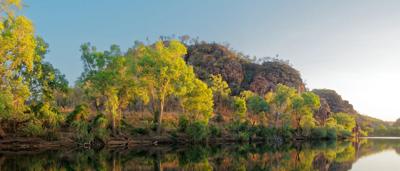 Katherine River Gorge, calm water, tree reflections, cliff, Northern Territory.