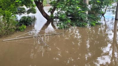 Header image: Flooded landscape, Jason Hills, hoist, water, sky.