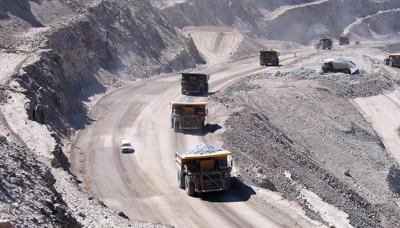 Header image: Wind turbines against a blue sky, Adani logo.