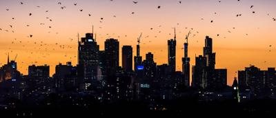 Woman smiling, walking, heading out to dinner.