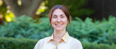 Woman, Darcie Carruthers, smiling, outdoors, headshot.