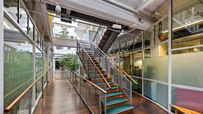Victorian terrace house, Leicester Street, Carlton, Melbourne. Brick facade, ornate details, street view.