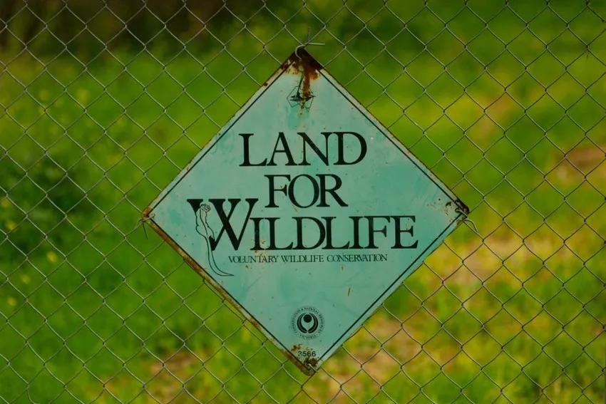 A Land for Wildlife sign marking a property enrolled in the conservation program