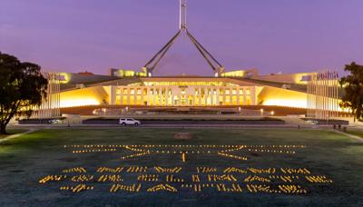 Header image: Sunrise over a landscape with trees and a bright sky.