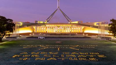 Header image: Sunrise over a landscape with trees and a bright sky.