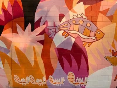 Mural with colorful abstract shapes and patterns.