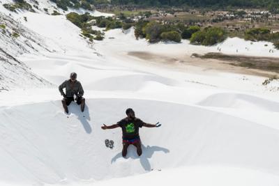 Shelburne Bay, Cape York. Aerial view of coastline, sandy beach, turquoise water, and lush green vegetation.