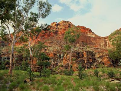 Keep River landscape, rocky gorge, water, trees, blue sky.