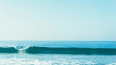 Wave-like texture, blue and white gradient, abstract design.