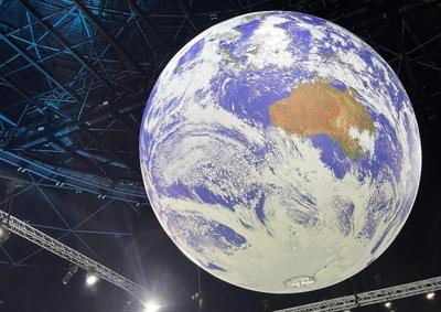 Globe graphic with COP26 text overlay.