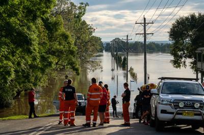 Header image: Flooded landscape, dark clouds, water covering land, trees partially submerged.