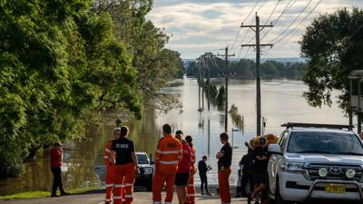 Header image: Flooded landscape, dark clouds, water covering land, trees partially submerged.