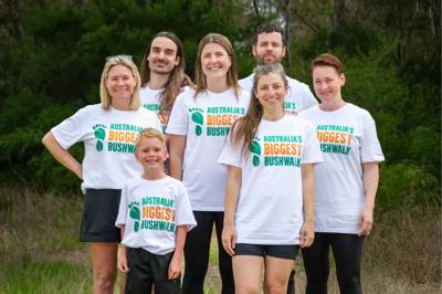 Woman holding a donation box, smiling, with a fundraising page background.