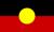 Australian Aboriginal Flag, red earth, black top, yellow sun disc.